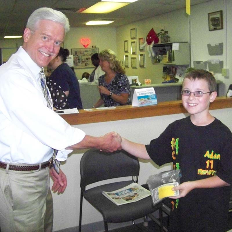 RC Fest participants racing remote control cars in support of ImpactLife